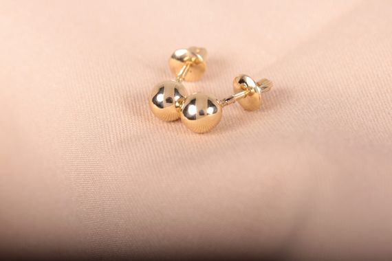 Сережки пуссеты шарики  из желтого золота