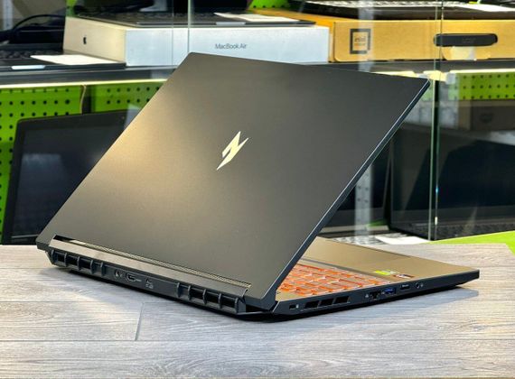 Ігровий ноутбук Acer Nitro V16 ANV16-61 / 16" (1920x1200) IPS / AMD Ryzen AI 7 350 (8 (16) ядер по 2.0 - 5.0 GHz) / 16 GB DDR5 / 1000 GB SSD NVMe / nVidia GeForce RTX 5060, 8 GB GDDR7, 128-bit / WebCam / Win 11 б/в | Зображення 4