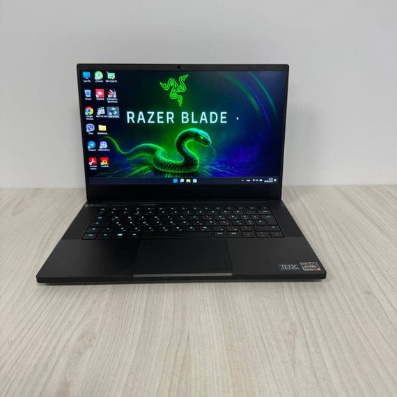 Ігровий ноутбук Razer Blade 14 RZ09-0370 / 14" (2560x1440) IPS / AMD Ryzen 9 5900HX (8 (16) ядер по 3.3 - 4.6 GHz) / 16 GB DDR4 / 1000 GB SSD NVMe / nVidia GeForce RTX 3080, 8 GB GDDR6, 256-bit / WebCam б/в | Зображення 1