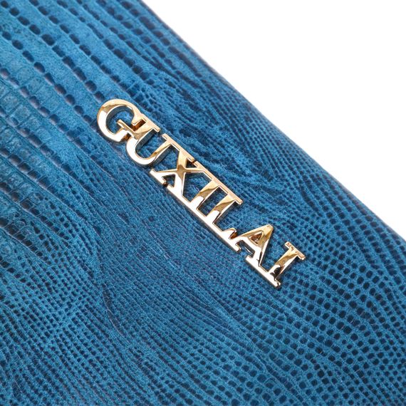 Кошелек женский кожаный с тиснением Guxilai 18966 Синий | Зображення 6