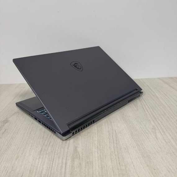 Игровой ноутбук Б-класс MSI Creator 16 AI Studio A1VIG / 16" (3840x2400) IPS / Intel Core Ultra 9 185H (16 (22) ядер по 3.9 - 5.1 GHz) / 32 GB DDR5 / 1000 GB SSD NVMe / nVidia GeForce RTX 4090, 16 GB GDDR6, 256-bit / WebCam б/у | Зображення 6