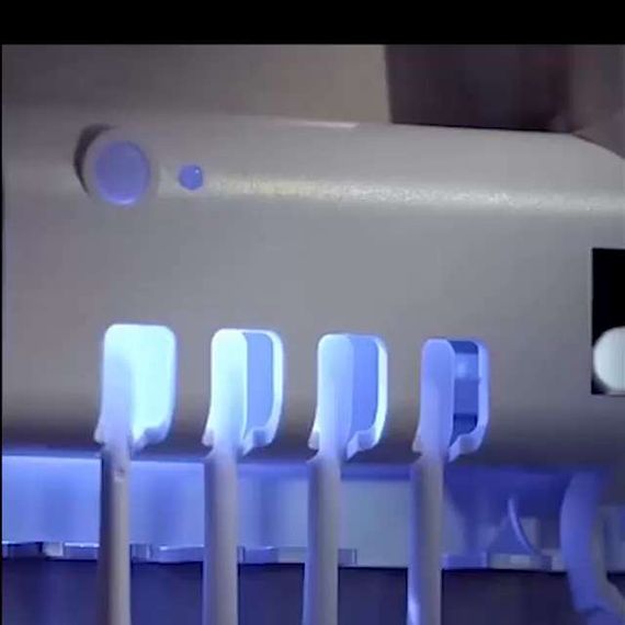 Держатель-диспенсер для зубной пасты и щеток Toothbrush sterilizer автоматический | Зображення 1