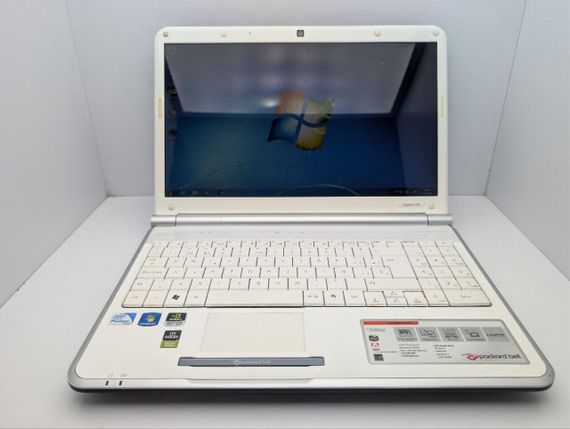 Ноутбук Packard Bell TJ66 / 15.6" (1366x768) TN / Intel Pentium T4300 (2 ядра по 2.1 GHz) / 4 GB DDR2 / 320 GB HDD / nVidia GeForce G210M, 512 MB GDDR3, 64-bit / WebCam / DVD-ROM б/у | Зображення 1