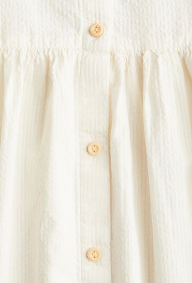 Дитяча літня сукня для дівчинки H&M 116 см Молочний (25062604E) | Зображення 1