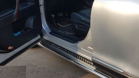 Боковые пороги Premium (2 шт., нерж.) Ø51 для Toyota Highlander 2008-2013 гг
