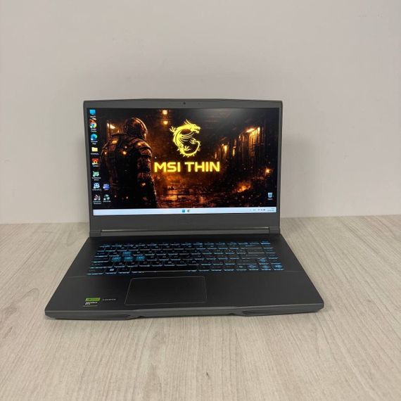 Игровой ноутбук Б-класс MSI Thin A15 B7UC / 15.6" (1920x1080) IPS / AMD Ryzen 5 7535HS (6 (12) ядер по 3.3 - 4.55 GHz) / 16 GB DDR5 / 512 GB SSD / nVidia GeForce RTX 3050, 4 GB GDDR6, 128-bit / WebCam б/у | Зображення 1