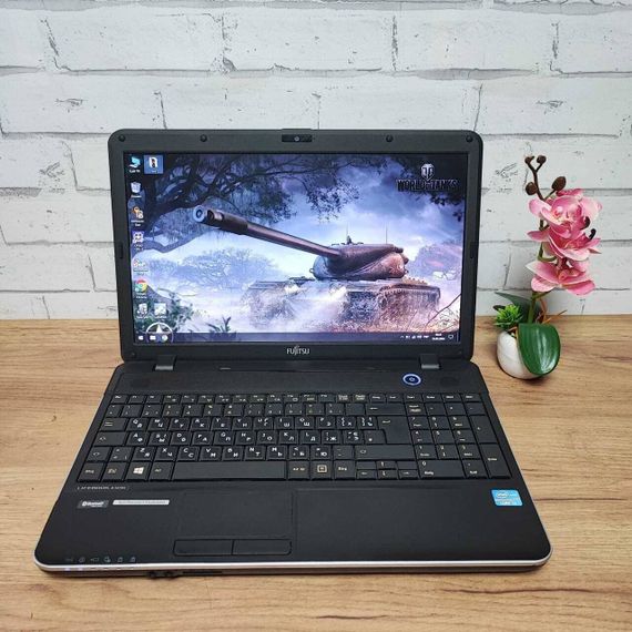 Ноутбук Б-класс Fujitsu LifeBook A512 / 15.6" (1366x768) TN / Intel Core i3-3110M (2 (4) ядра по 2.4 GHz) / 8 GB DDR3 / 120 GB SSD / Intel HD Graphics 4000 / WebCam / DVD-ROM / VGA б/у | Зображення 1