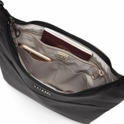 Сумка Pacsafe Cruise on the go Crossbody Чорна (20705100) | Зображення 1