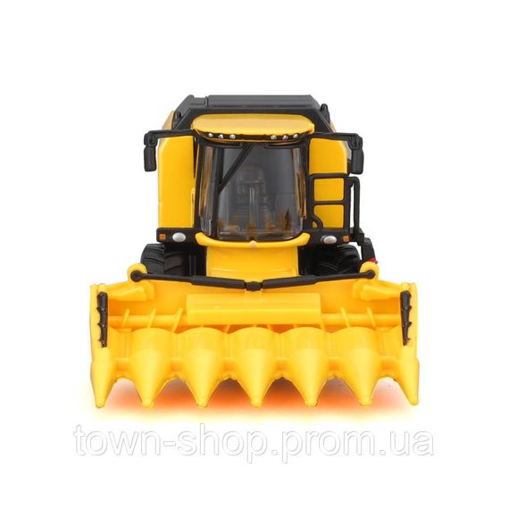 Автомодель комбайн Зерносборный "New Holland TC5.90" Bburago 18-31722 (1:24) | Зображення 1