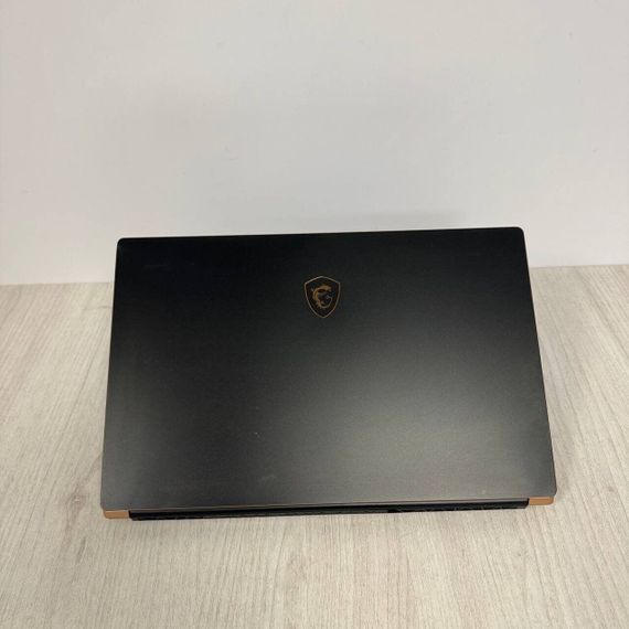 Игровой ноутбук Б-класс MSI GS75 Stealth 9SF / 17.3" (1920x1080) IPS / Intel Core i7-10875H (8 (16) ядер по 2.3 - 5.1 GHz) / 16 GB DDR4 / 512 GB SSD / nVidia GeForce RTX 2060, 6 GB GDDR6, 192-bit / WebCam б/у | Зображення 6