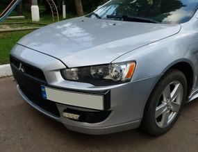 Підставка під номер (пластик) Під фарбування для Mitsubishi Lancer X 2008↗ рр.