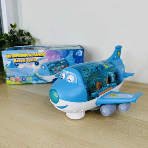 Іграшковий музичний літак з пасажирами, рухається, обертається 360 Airliner Light Music 8811-16 | Зображення 5