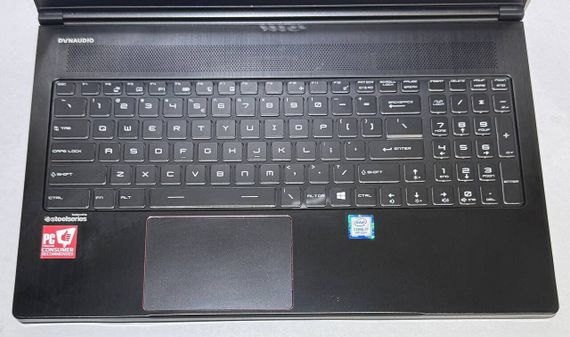 Игровой ноутбук Б-класс MSI GS63 Stealth 8RE / 15.6" (1920x1080) IPS / Intel Core i7-8750H (6 (12) ядер по 2.2 - 4.1 GHz) / 16 GB DDR4 / 512 GB SSD / nVidia GeForce GTX 1060, 6 GB GDDR5, 192-bit / WebCam / Win 11 Pro б/у | Зображення 4