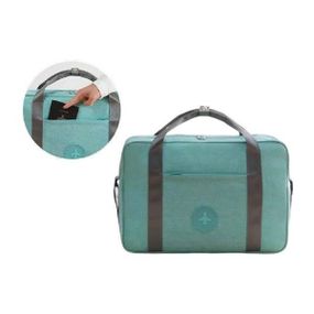 Вместительная дорожная сумка для путешествий с боковыми карманами Бирюзовая