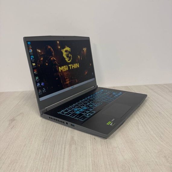 Игровой ноутбук Б-класс MSI Thin A15 B7UC / 15.6" (1920x1080) IPS / AMD Ryzen 5 7535HS (6 (12) ядер по 3.3 - 4.55 GHz) / 16 GB DDR5 / 512 GB SSD / nVidia GeForce RTX 3050, 4 GB GDDR6, 128-bit / WebCam б/у | Зображення 3