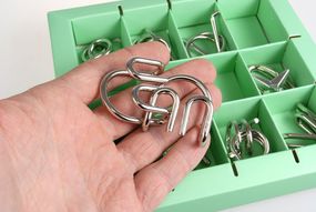 Набор головоломок Metall Puzzles green Eureka 3D Puzzle 473357, 10 головоломок