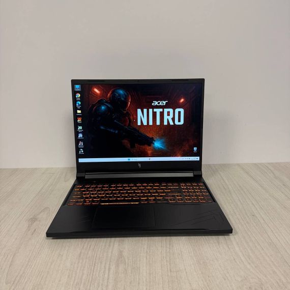 Игровой ноутбук Б-класс Acer Nitro V16 ANV16-41 / 16" (1920x1200) IPS / AMD Ryzen 5 8645HS (6 (12) ядер по 4.3 - 5.0 GHz) / 16 GB DDR5 / 512 GB SSD / nVidia GeForce RTX 4060, 8 GB GDDR6, 128-bit / WebCam б/у | Зображення 1