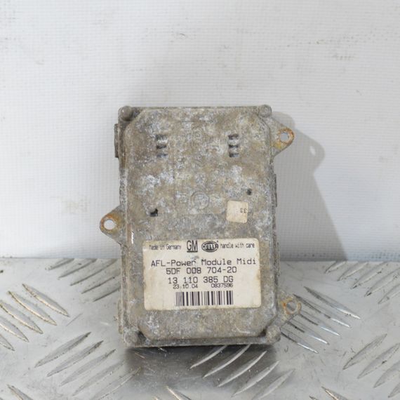 Блок управління поворотом ксенону Opel Astra H 2004-2010 Модуль повороту ксенону Опель Астра Н 5DF008704 13110385DG