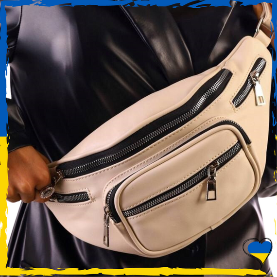 Бананка жіноча з гладкої екошкіри апрікотовий колір. Сумка через плече жіноча