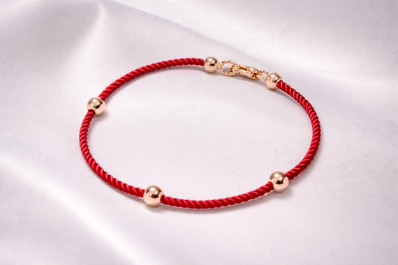 Браслет из жёлтого золота с красной нитью BR-0356 18.5