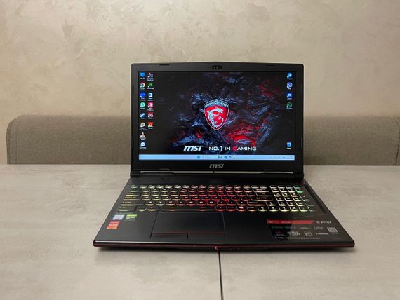 Игровой ноутбук MSI GL63 9SDK-840US / 15.6" (1920x1080) IPS / Intel Core i7-9750H (6 (12) ядер по 2.6 - 4.5 GHz) / 16 GB DDR4 / 512 GB SSD M.2 / nVidia GeForce GTX 1660 Ti, 6 GB GDDR6, 192-bit / WebCam б/у + Подарок Проводная мышь / USB | Зображення 1