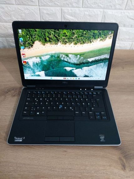 Ноутбук Б-класс Dell Latitude E7440 / 14" (1920x1080) TN / Intel Core i5-4300U (2 (4) ядра по 1.9 - 2.9 GHz) / 8 GB DDR3 / 256 GB SSD / Intel HD Graphics 4400 / WebCam б/у | Зображення 1