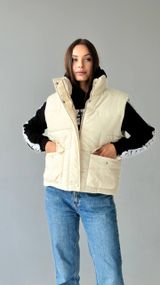 Жіноча жилетка молочна