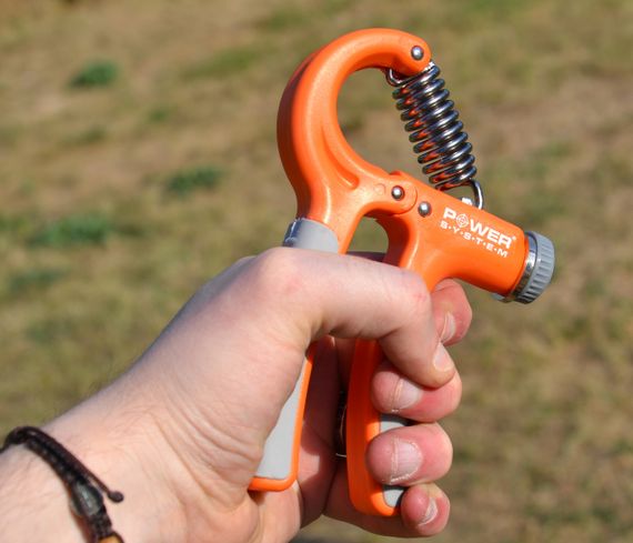 Еспандер кистьовий Power System PS-4021 з регульованим навантаженням 10-40 кг.  Power Hand Grip Orange | Зображення 6