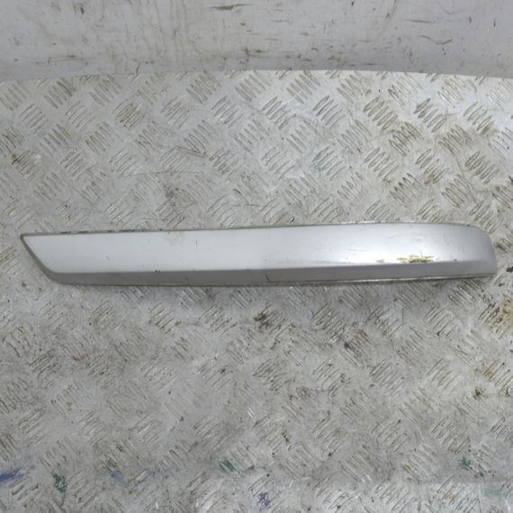 Накладка заднього бампера ліва Opel Astra H 2004-2010 Молдинг заднього бампера лівий Опель Астра Х 13138162