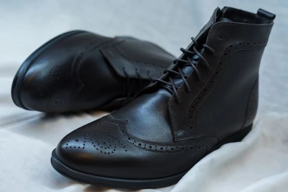 Ботинки коричневые с цигейкой 42 размер | Зображення 1