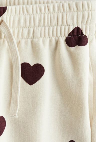 Дитячі теплі спортивні штани-джогери для дівчинки H&M 122 см Кремові (25090804F) | Зображення 1