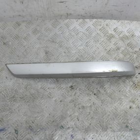 Накладка заднього бампера ліва Opel Astra H 2004-2010 Молдинг заднього бампера лівий Опель Астра Х 13138162