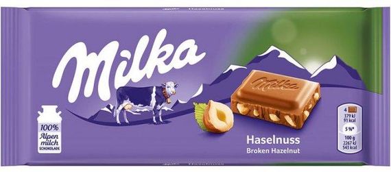 Шоколад молочный с лесными орехами Milka Haselnuss, 100 г, Швейцария
