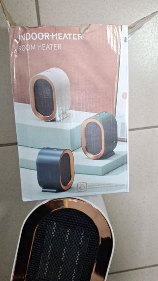 ОЧЕНКА! Настільний міні нагрівач AIR HEATER 1200W, електричний, від мережі 220 В (Трення на корпусі 2934) | Зображення 1