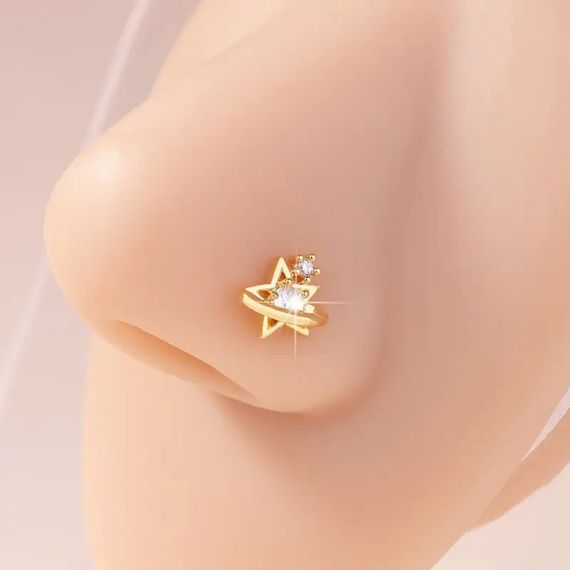 Елегантна золотиста каблучка-сережка для носа у вигляді зірки з білими кристалами 8 мм