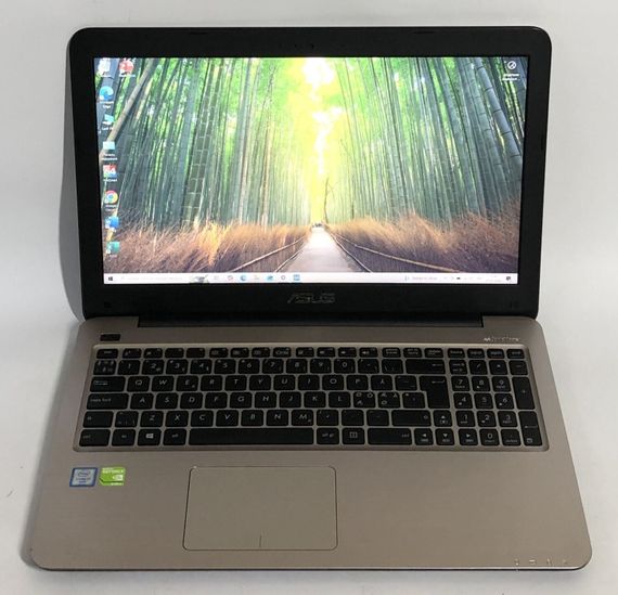 Ноутбук Б-клас Asus X556U / 15.6" (1920x1080) TN / Intel Core i7-6500U (2 (4) ядра по 2.5 - 3.1 GHz) / 8 GB DDR4 / 512 GB SSD / nVidia GeForce 940MX, 2 GB GDDR5, 64-bit / WebCam / DVD-ROM / Win 10 Home б/в + Подарунок Накопичувач Kingston 64 ГБ | Зображення 1