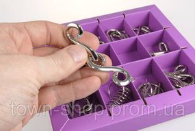 Набор головоломок Metall Puzzles violet Eureka 3D Puzzle 473359, 10 головоломок