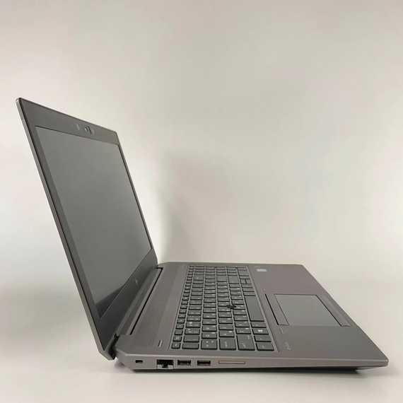 Мобильная рабочая станция Б-класс HP zBook 15 G5 / 15.6" (1920x1080) IPS / Intel Core i7-8750H (6 (12) ядер по 2.2 - 4.1 GHz) / 16 GB DDR4 / 250 GB SSD / nVidia Quadro P2000, 4 GB GDDR5, 128-bit / WebCam / Fingerprint б/у + Подарок Беспроводная мышь / USB | Зображення 3