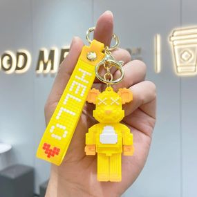 Брелок KAWS Companion Yellow Сонячний Ведмедик Енергія Арт-сувенір для колекціонерів Кавс Жовтий