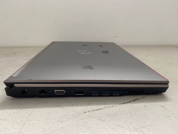 Мобільна робоча станція Б-клас Fujitsu Celsius H730 / 15.6" (1920x1080) TN / Intel Core i7-4900MQ (4 (8) ядра по 2.8 - 3.8 GHz) / 16 GB DDR3 / 512 GB SSD / nVidia Quadro K2100M, 2 GB GDDR5, 128-bit / WebCam б/в + Подарунок Зубна щітка Colgate / Bluetooth | Зображення 2