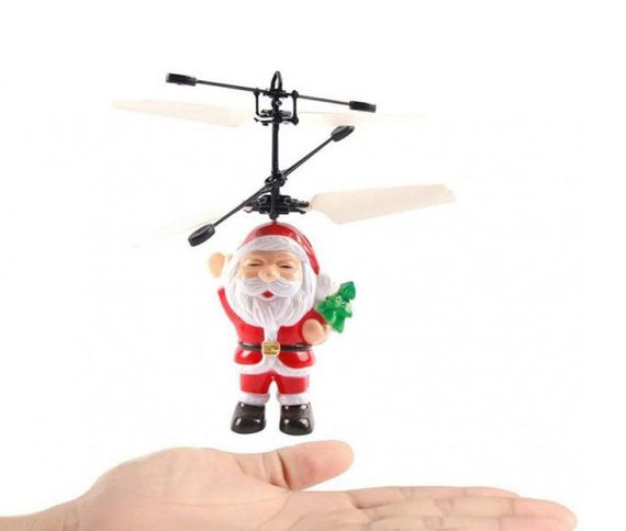 Летающая игрушка Flying Santa летающий Дед Мороз Cанта Клаус | Зображення 1